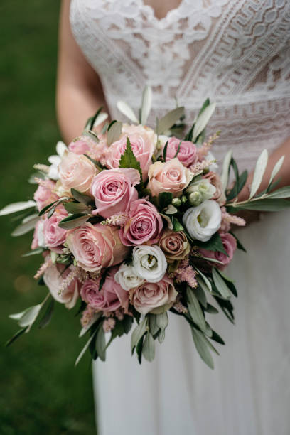 istock vintage bride holding bridal flowers 1222992443