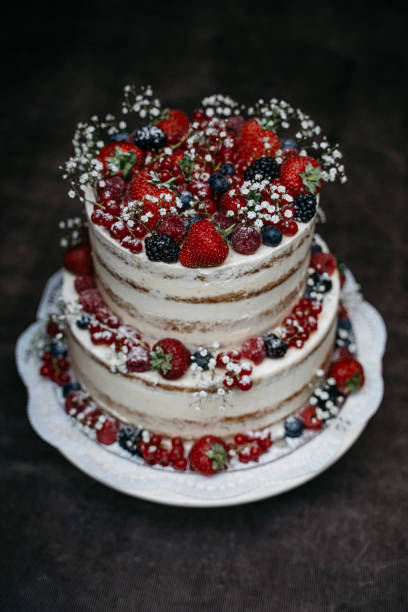 istock half naked vintage wedding cake with berries 1222993387