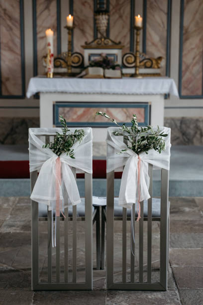 istock decorated wedding chairs at church 1222993471
