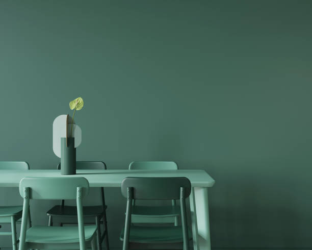 istock Dining room in monochrome green with a large table, chairs and a vase. 1222993643