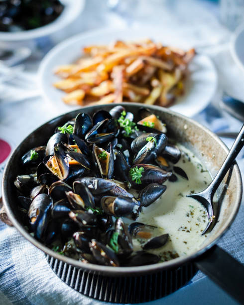 Clams with French Fries - Moules Frites stock photo