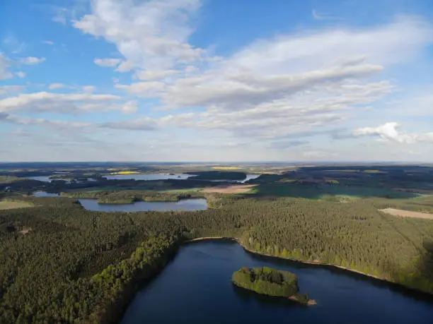 Aerial view of crystal clear lake Krüselinsee with Lisisland, Mecklenburg Vorpommern, Brandenburg, Germany