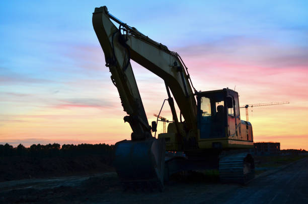 istock Excavator with crusher bucket for crushing concrete. Construction waste recycling for construction mix. 1222996962