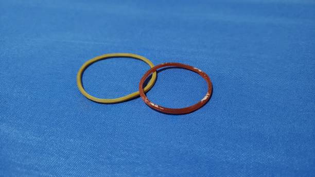 istock Red and yellow rubber band 1222998582