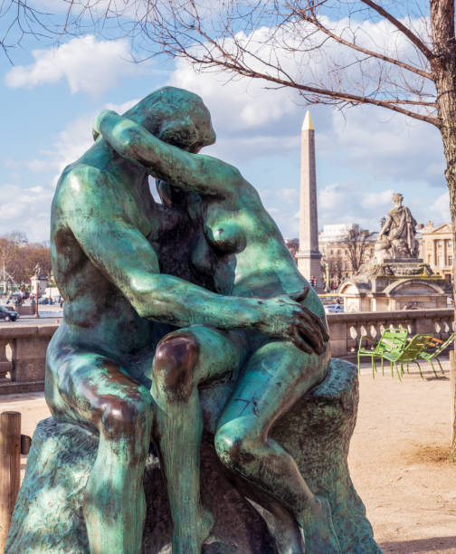 Bronze statue The Kiss by Auguste Rodin in the Tuileries Garden - Paris stock photo