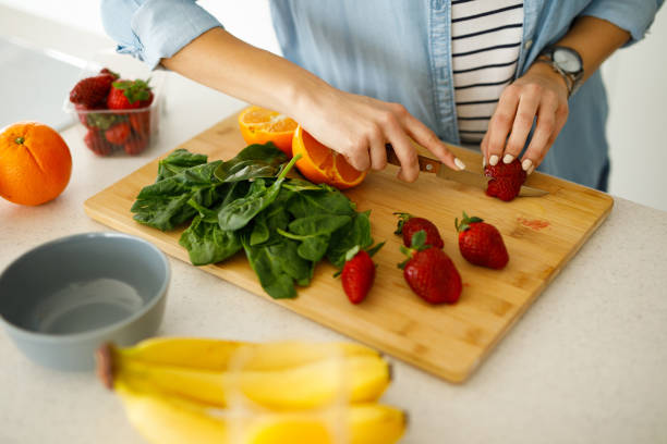 istock Step by step preparation of spinach smoothie in the kitchen 1223001559