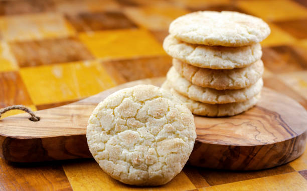 istock A stack of snickerdoodle cookies on a wooden board sitting on a wooden table. 1223001645