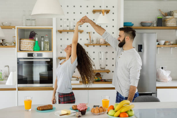 istock Happy romantic couple dancing in the kitchen 1223001824