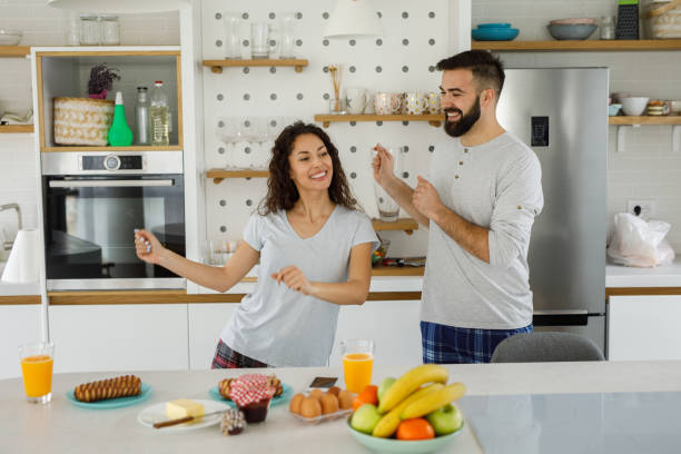 istock Happy romantic couple dancing in the kitchen 1223004343