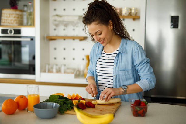 istock Step by step preparation of spinach smoothie in the kitchen 1223005443