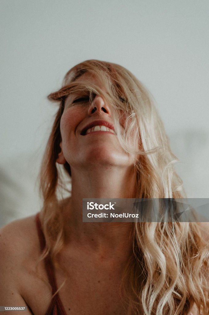 Portrait of a blonde woman Portrait of a blonde woman at home Adult Stock Photo