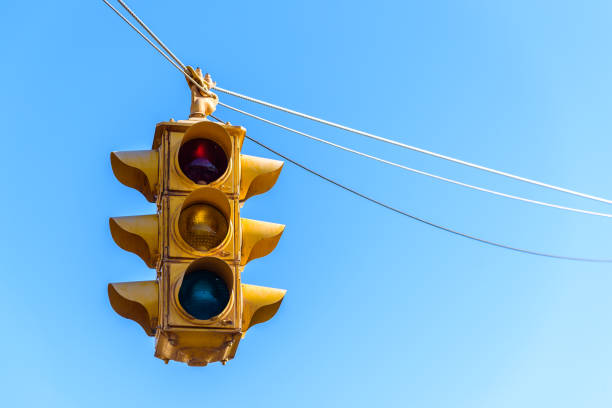 istock American traffic light, set against a blue summer sky 1223007127