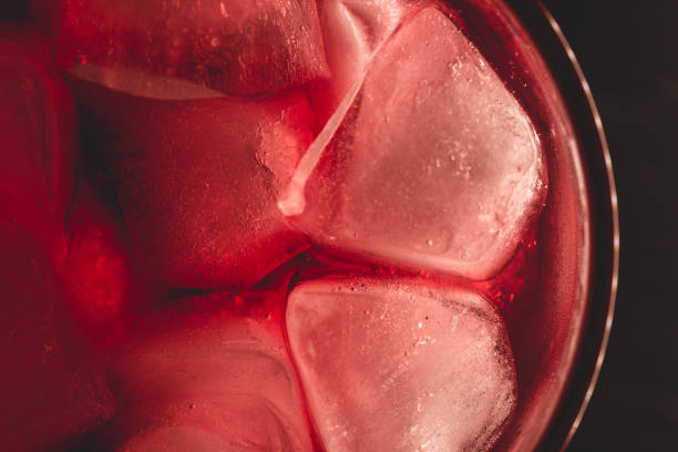 istock Red drink with ice cubes in the glass 1223008262