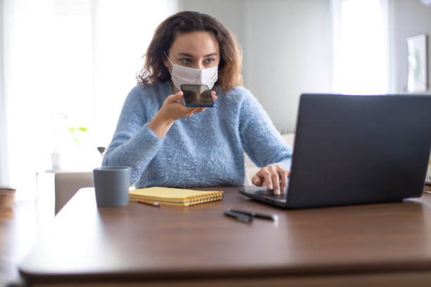 istock Young woman working on laptop at home 1223010265
