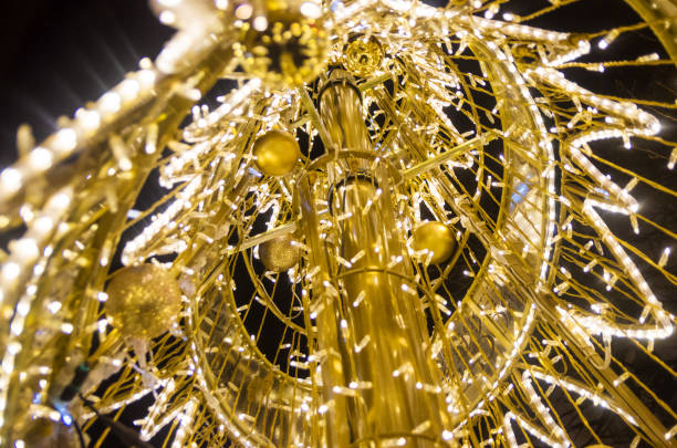 istock yellow Christmas lights in defocus; christmas background 1223010383
