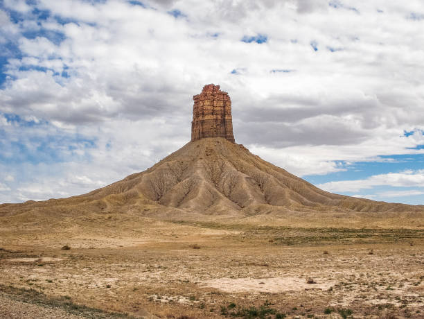 istock Single desert hoodoo surrounded by a massive sand pile in the desert 1223012824