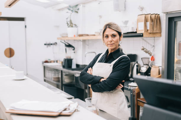 istock Confident Waitress Behind the Bar Counter 1223013448
