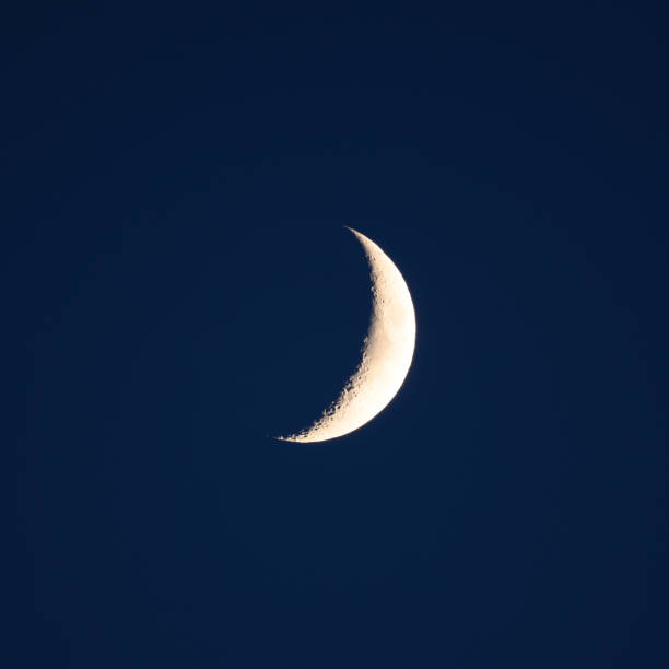 istock Sliver of Moon 1223014146