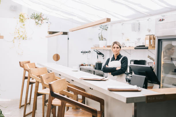 istock Confident Waitress Behind the Bar Counter 1223014241