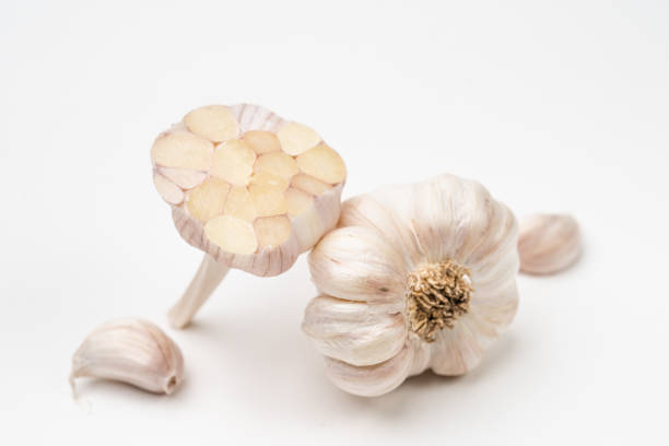 istock Close-up garlic on a white background,Garlic spice 1223017727