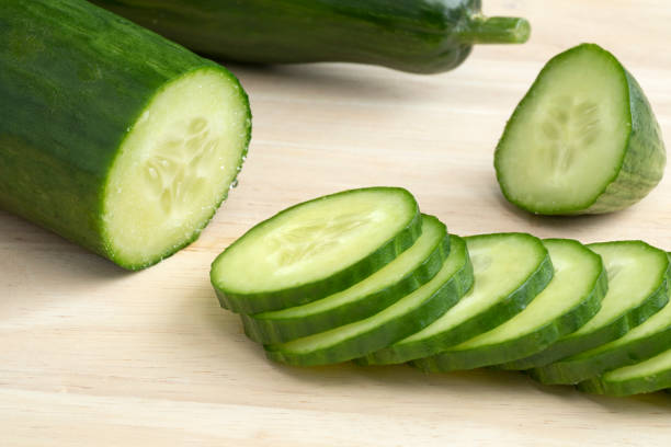 istock Fresh green cut cucumber and slices 1223017784