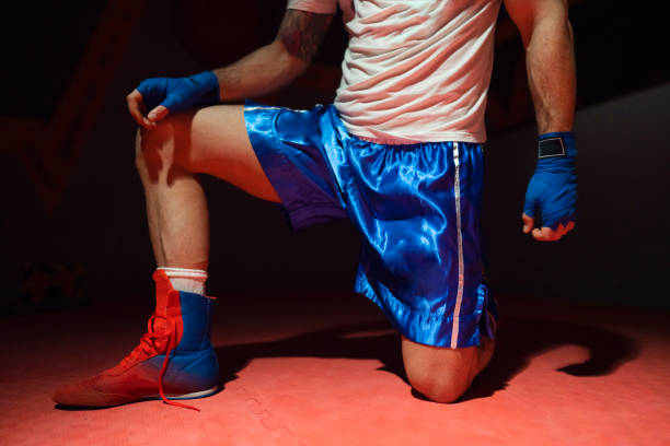 istock Boxer and untied laces on his sneakers 1223018274