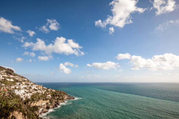 beautiful amalfi coastline and horizon over water in italy.
