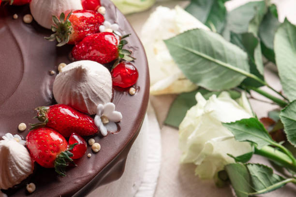 Delicious cake on plate on table