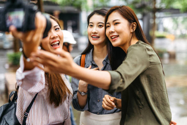 istock Women vlogging on city street 1223029733