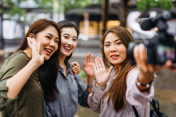 istock Women vlogging on city street 1223029838