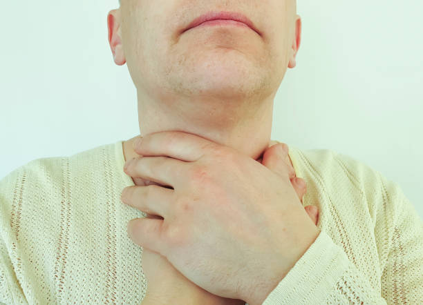 istock man sore throat symptom illness 1223033052