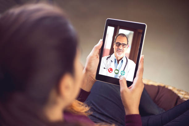 istock Woman in video conference with doctor 1223033287