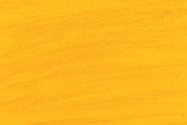 Turmeric or curcuma powder texture background.