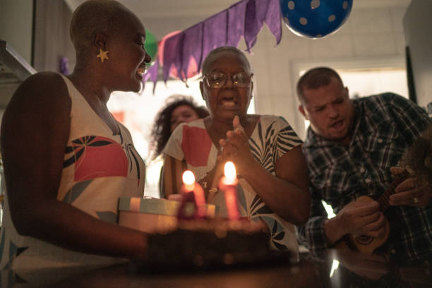 istock Family celebrating birthday at home 1223035497