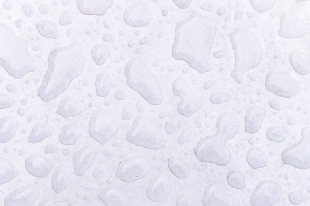 drops of water on a white surface