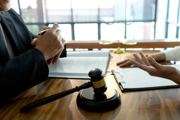 istock Judge or lawyer talking  with team or client 1223038272
