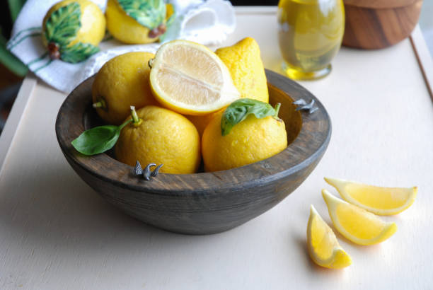 istock Lemons sliced on a kitchen table in a bowl 1223039888