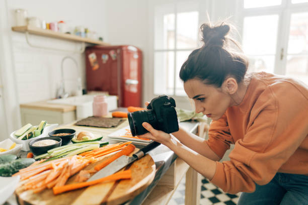 istock Food blogger photographing sushi making process 1223040201