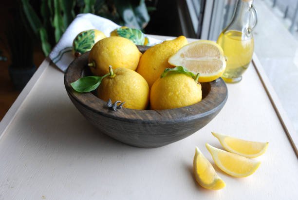 istock Lemons sliced on a kitchen table in a bowl 1223041059