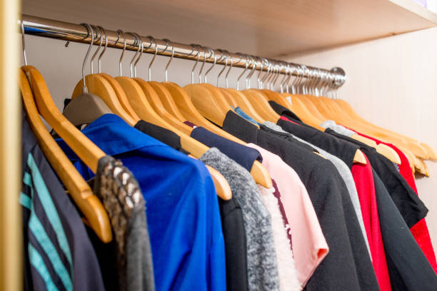 istock clothes weigh on the shoulders in the closet. Second hand 1223042063