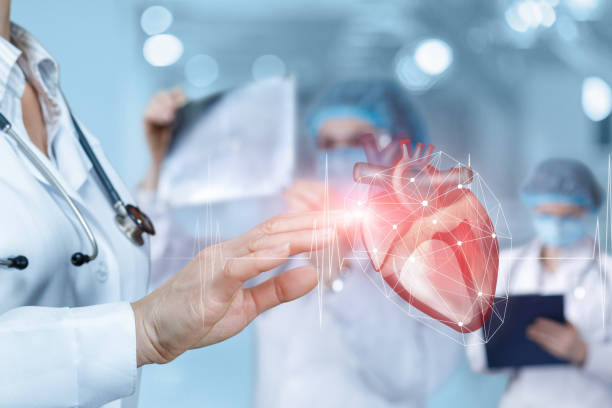 istock Doctor clicks on a heart with a pulse . 1223049021