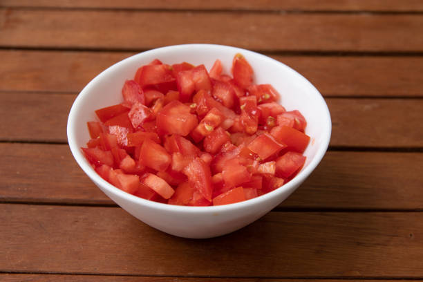istock Chopped or Diced Tomatoes in a bowl 1223049255