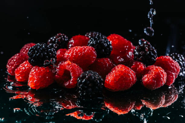 Close-up on a dark background. Red berry closeup. Vegetarian healthy food.