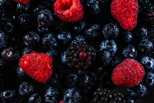 istock A scattering of berries. Pure berries, spraying water. 1223049478