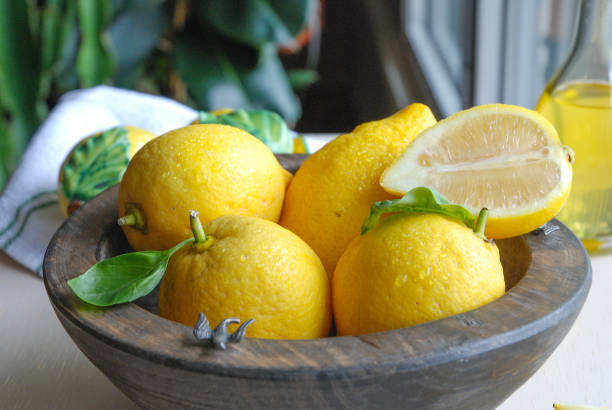 istock Lemons sliced on a kitchen table in a bowl 1223049554