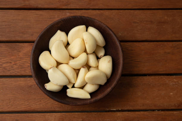 istock Peeled Garlic Cloves in a bowl 1223050427