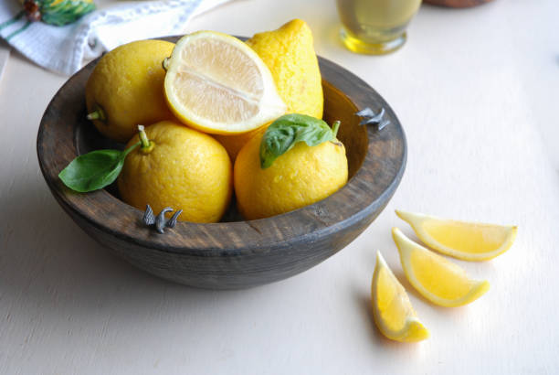 istock Lemons sliced on a kitchen table in a bowl 1223050445