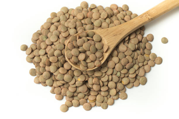 istock Pile of raw lentil in a spoon 1223050992