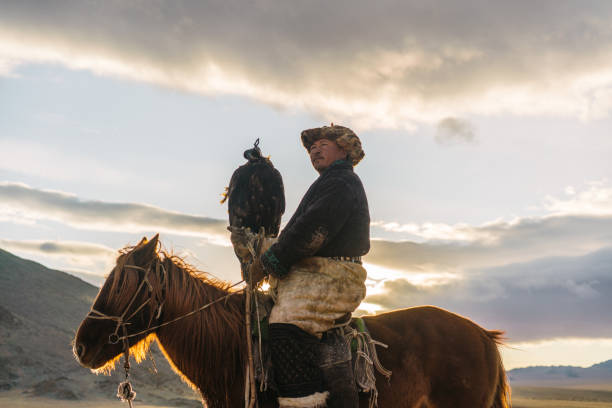 istock Eagle hunter near the river in Mongolia 1223053261