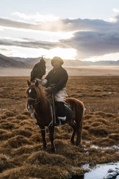 istock Eagle hunter near the river in Mongolia 1223053279